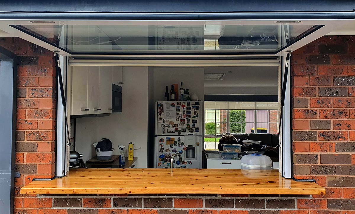 Gas strut window fully open above benchtop